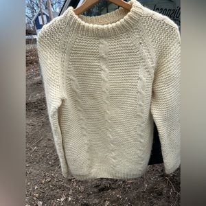 Long knit sweater, can be a sweater dress on someone who is on the shorter side